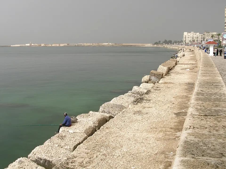 The seafront Corniche curving along the Mediterranean at Alexandria