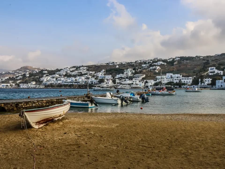 Whitewashed houses along the waterfront of Mykonos Town
